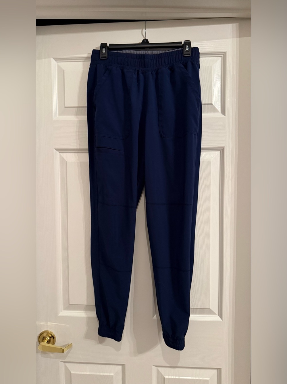 Women’s Scrubstar scrubs.
PREMIUM SCRUBWEAR pants. Blue/indigo. Size small.